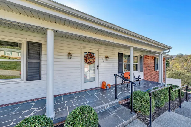 a front view of a house with patio