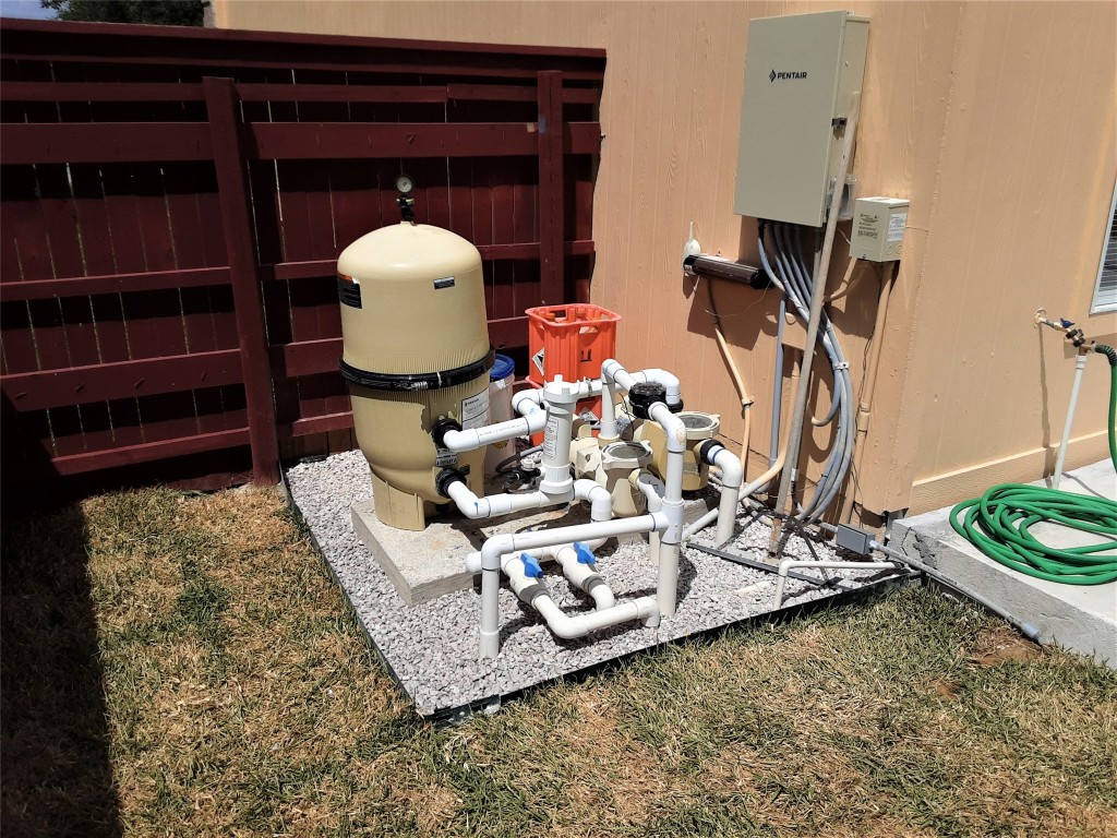 205 Rinehardt Street Hutto, TX 78634 - Photo 35 of 40 a living room with furniture and a mirror