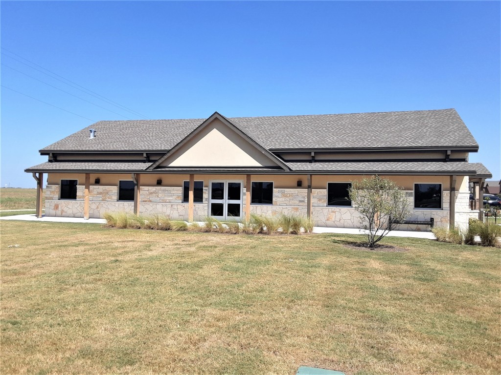 205 Rinehardt Street Hutto, TX 78634 - Photo 39 of 40 a front view of a house with swimming pool