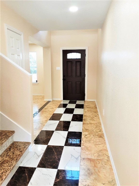 205 Rinehardt Street Hutto, TX 78634 - Photo 7 of 40 a picture of a black and white checkered floor