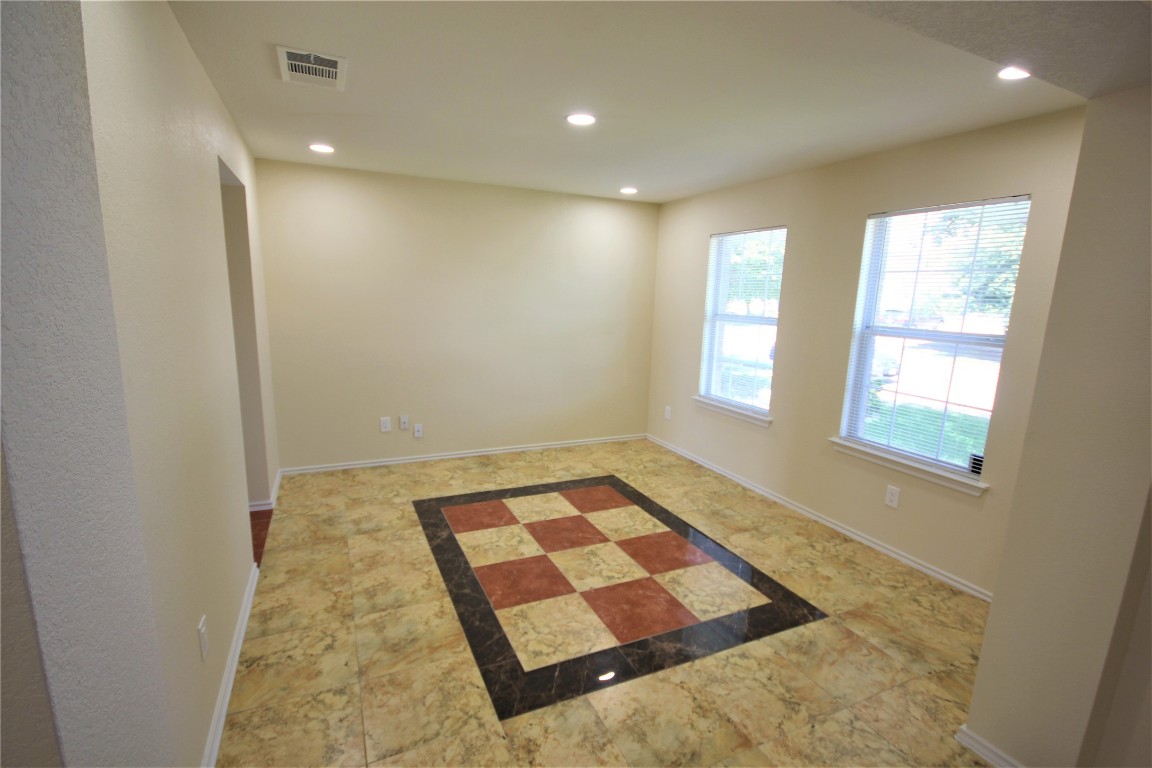 205 Rinehardt Street Hutto, TX 78634 - Photo 8 of 40 a view of a room with a rug