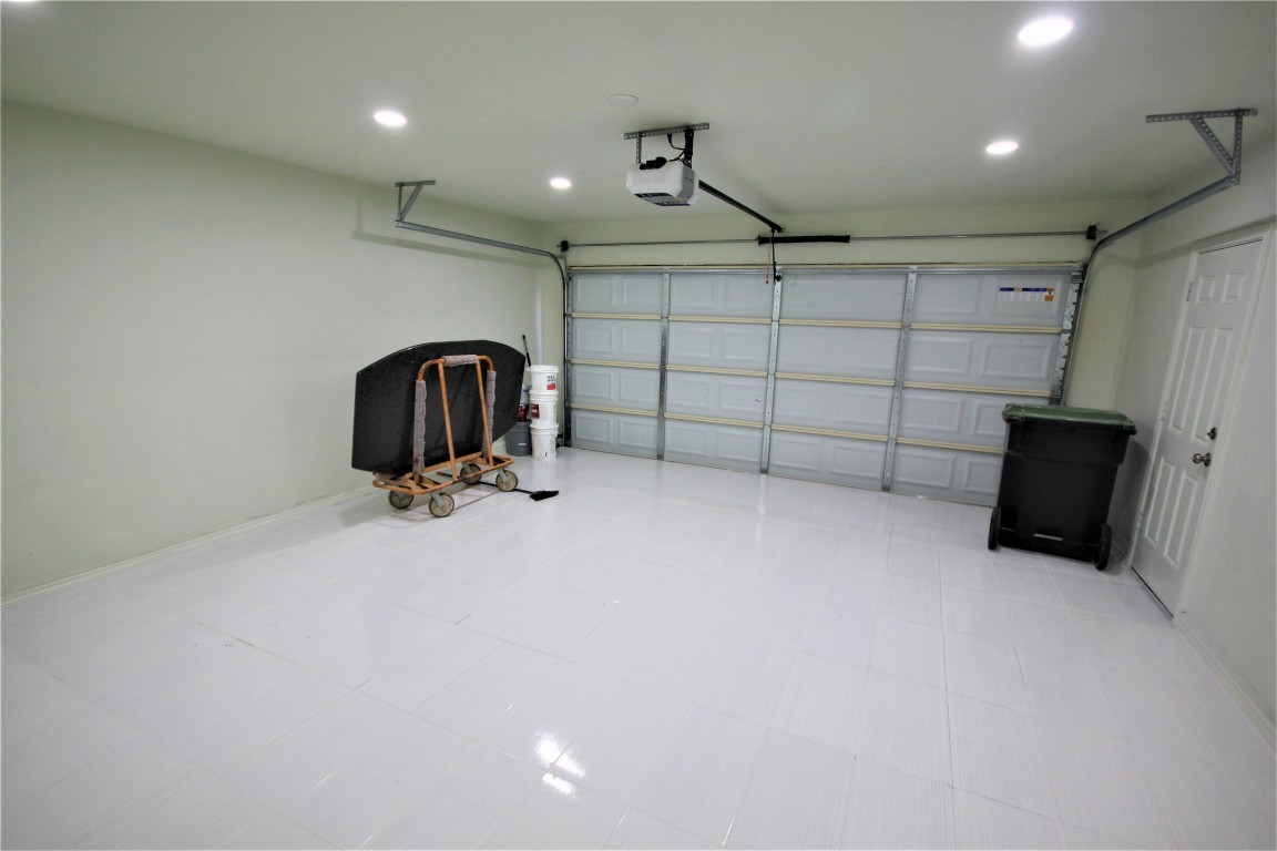 205 Rinehardt Street Hutto, TX 78634 - Photo 10 of 40 a view of a garage