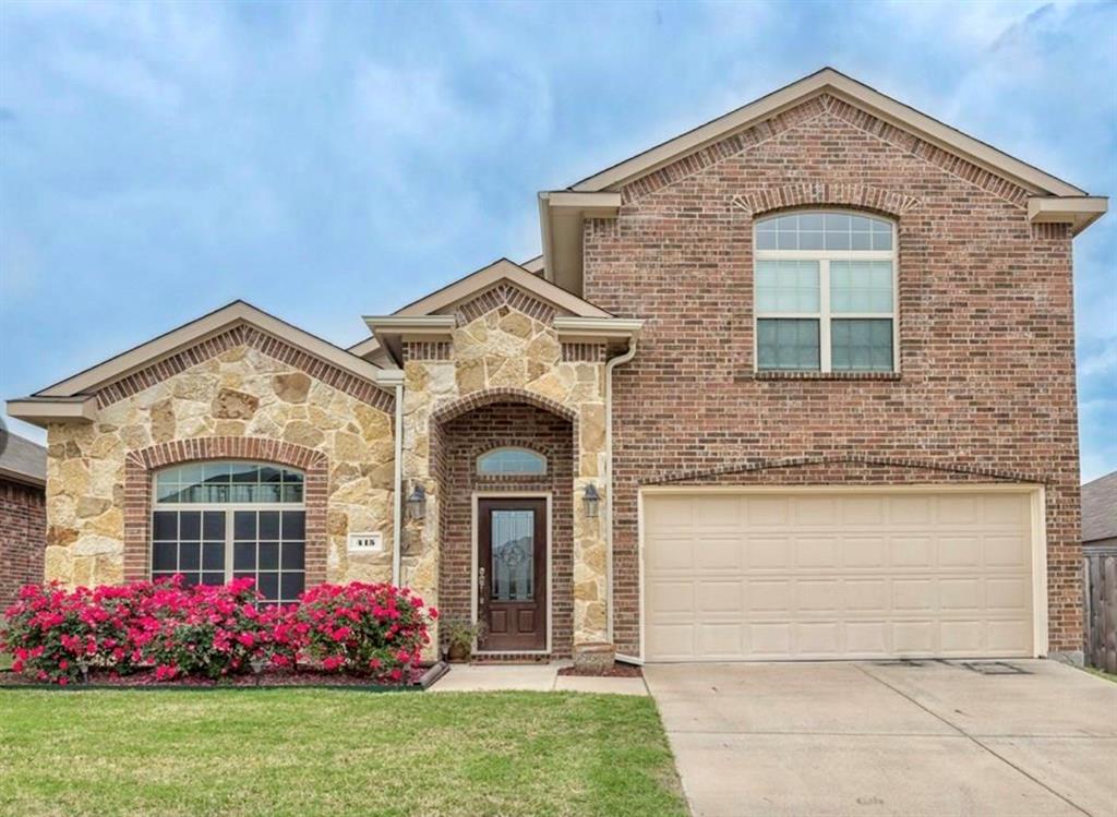 415 Harding Lane Lavon, TX 75166 - Photo 1 of 13 Brick and stone facade featuring an arched entryway