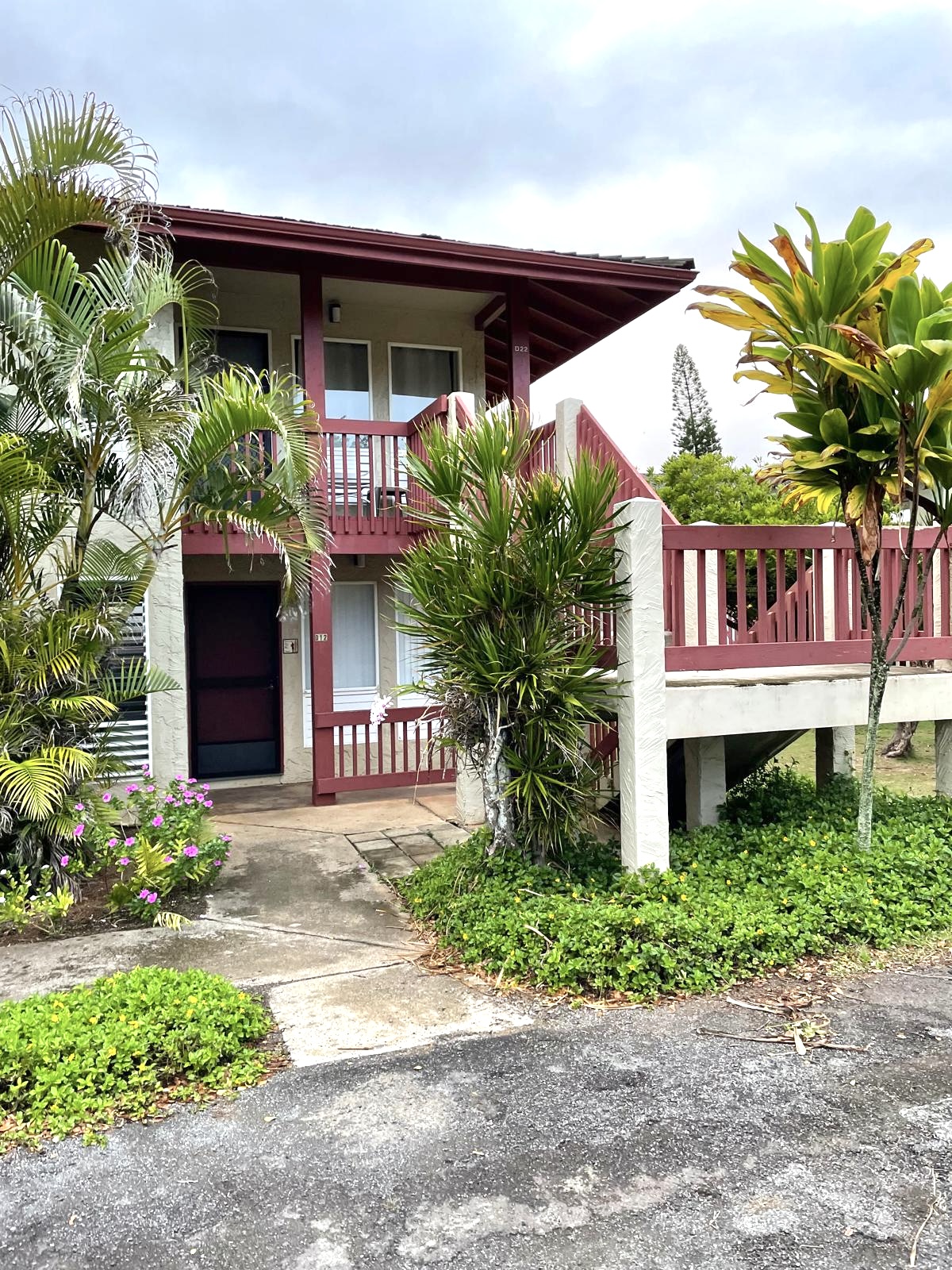 4461 Kamoa Road, Unit D12 Kapaa, HI 96746 - Photo 11 of 13 a front view of a house with garden
