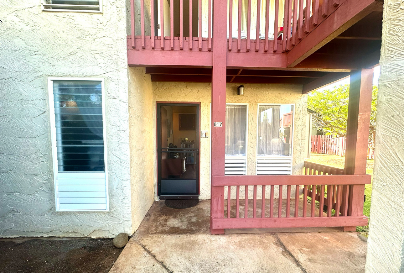4461 Kamoa Road, Unit D12 Kapaa, HI 96746 - Photo 2 of 13 a front view of a house with a large window