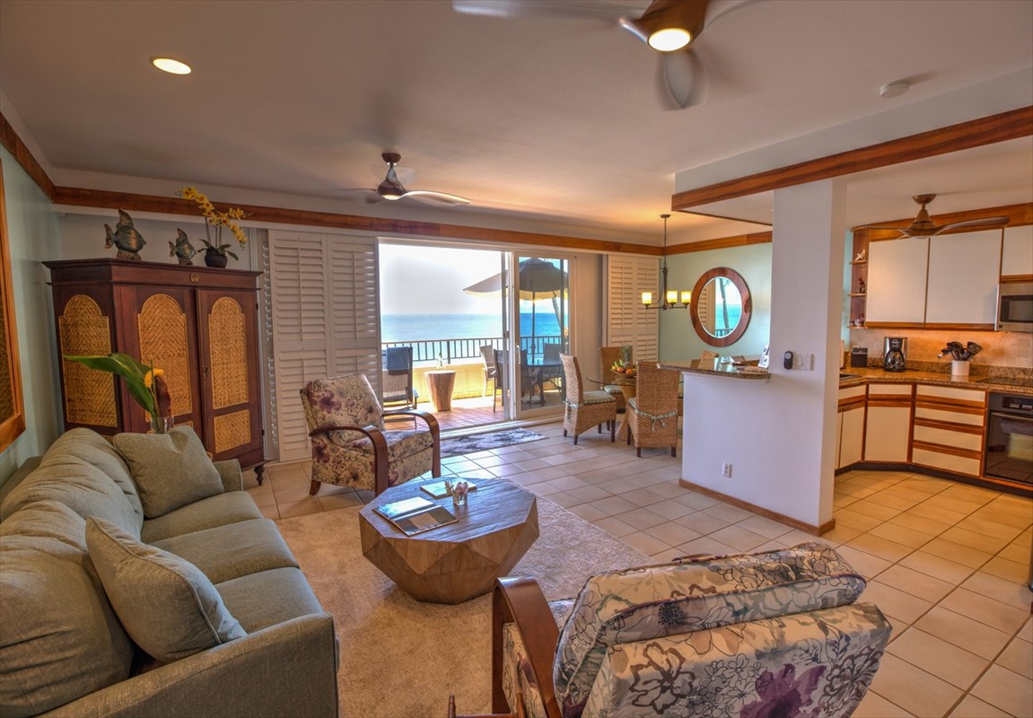 2640 Puuholo Road, Unit 134 Koloa, HI 96756 - Photo 3 of 20 a living room with furniture and a fireplace