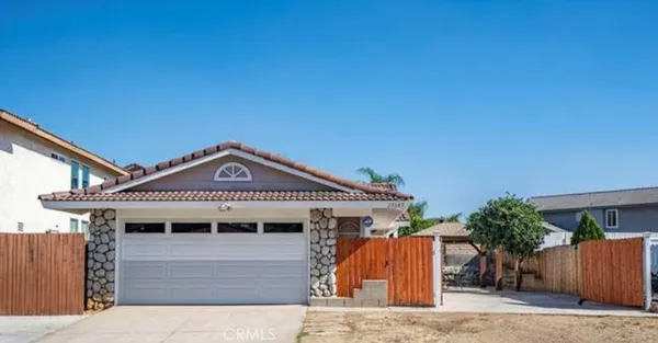 a front view of a house with a garage