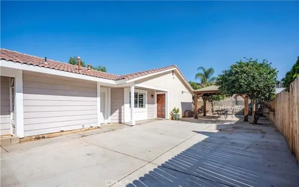 a view of a house with a patio