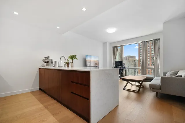 a room with furniture and a window