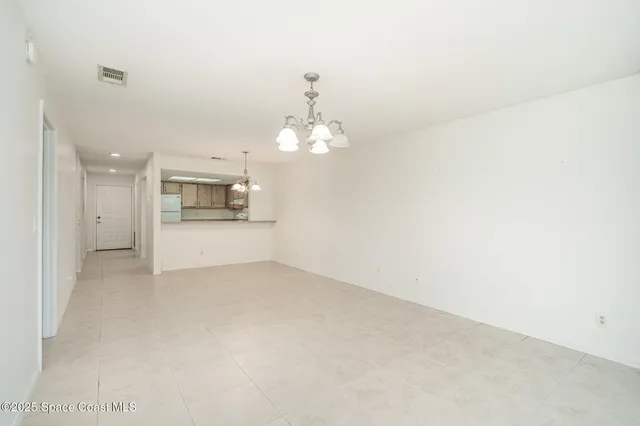 a view of a kitchen with a sink