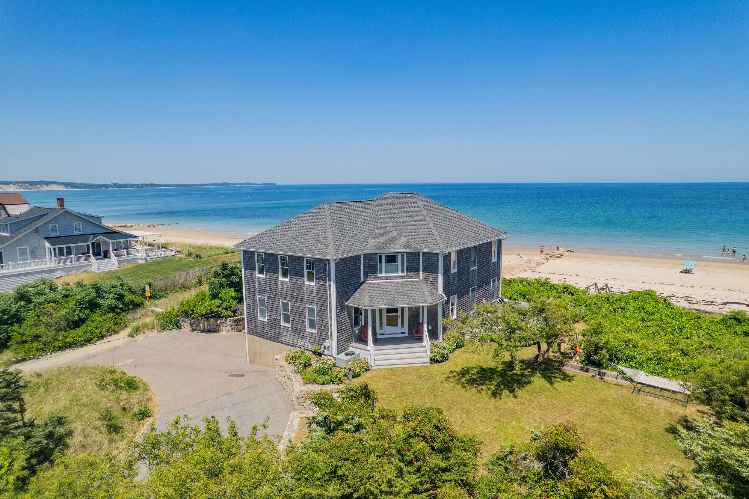 67 Phillips Road Sagamore Beach, MA 02562 - Photo 2 of 34 an aerial view of a house with a big yard