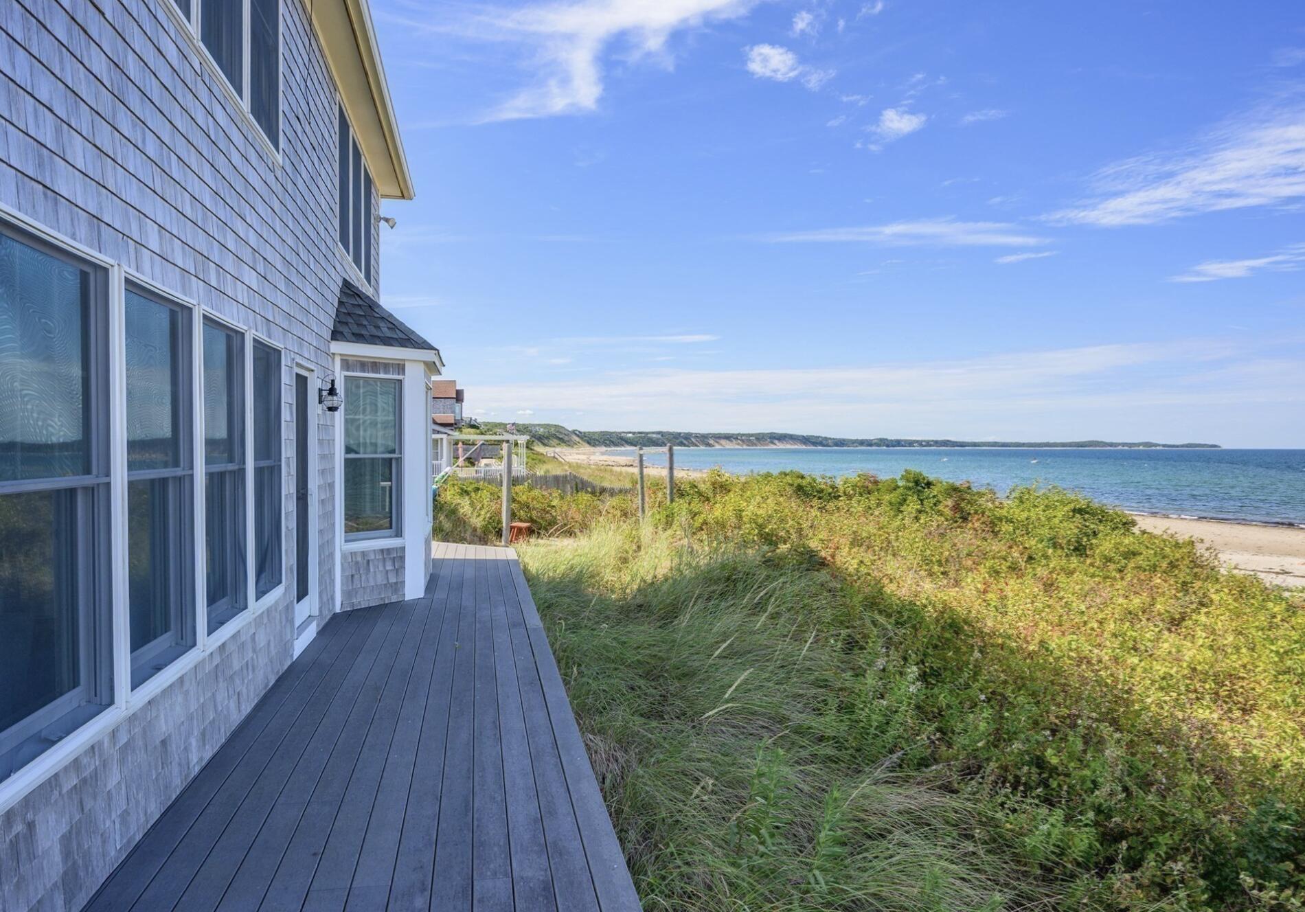 67 Phillips Road Sagamore Beach, MA 02562 - Photo 26 of 34 a view of an ocean from a balcony