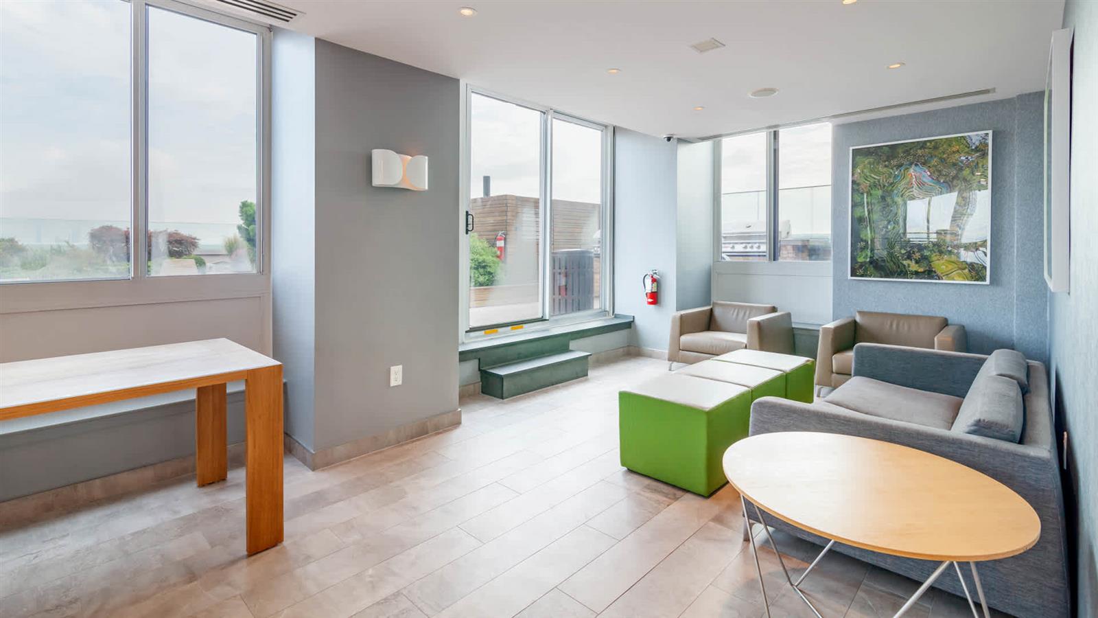 111 Lawrence Street, Unit 31J Brooklyn, NY 11201 - Photo 6 of 10 a living room with furniture and a window