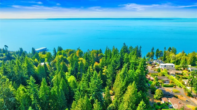 a view of a large body of water with a large window