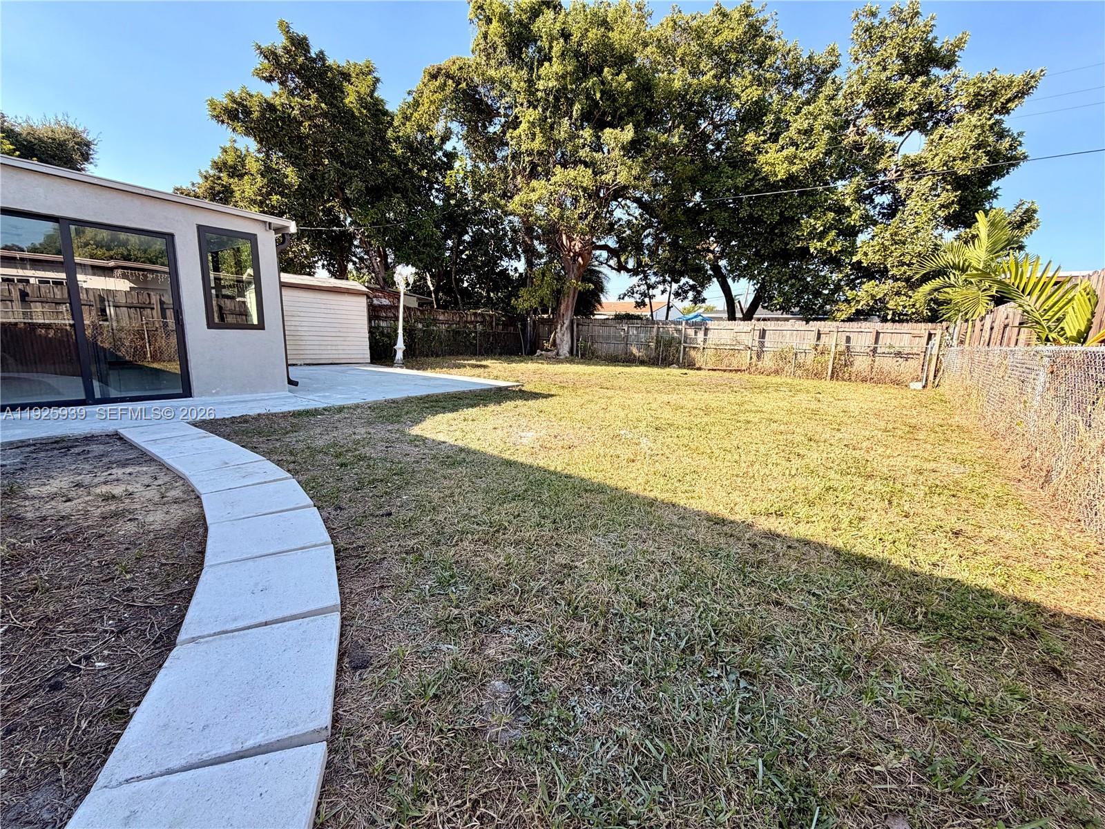 3527 Northwest 17th Street Miami, FL 33125 - Photo 15 of 16 a view of outdoor space yard and tree