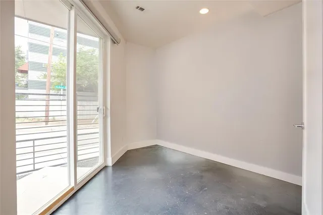 a view of a window in an empty room