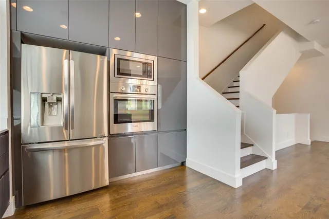 a view of entryway with wooden floor