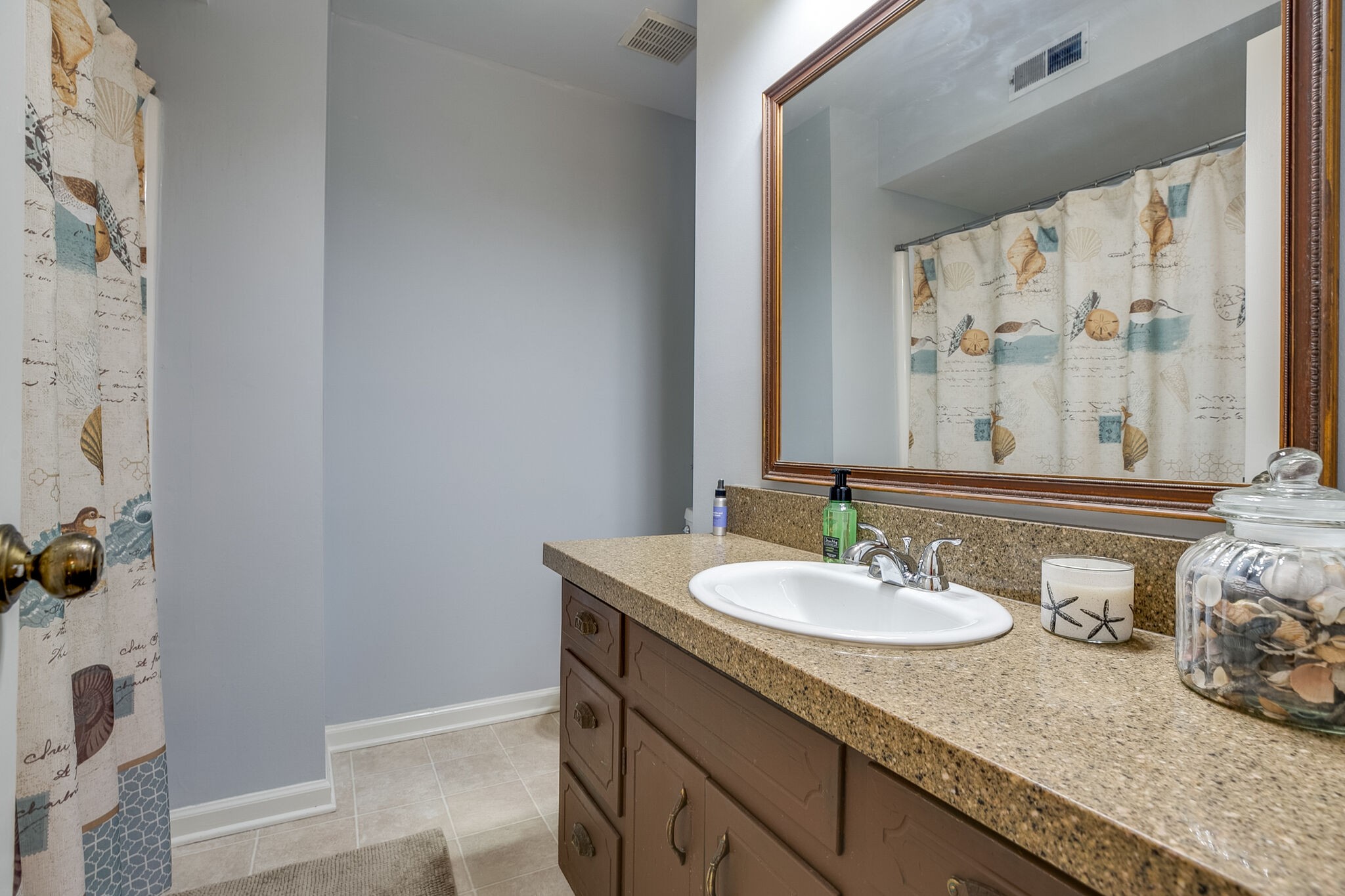 117 Paschal Drive Murfreesboro, TN 37128 - Photo 11 of 32 a bathroom with a granite countertop sink and a mirror