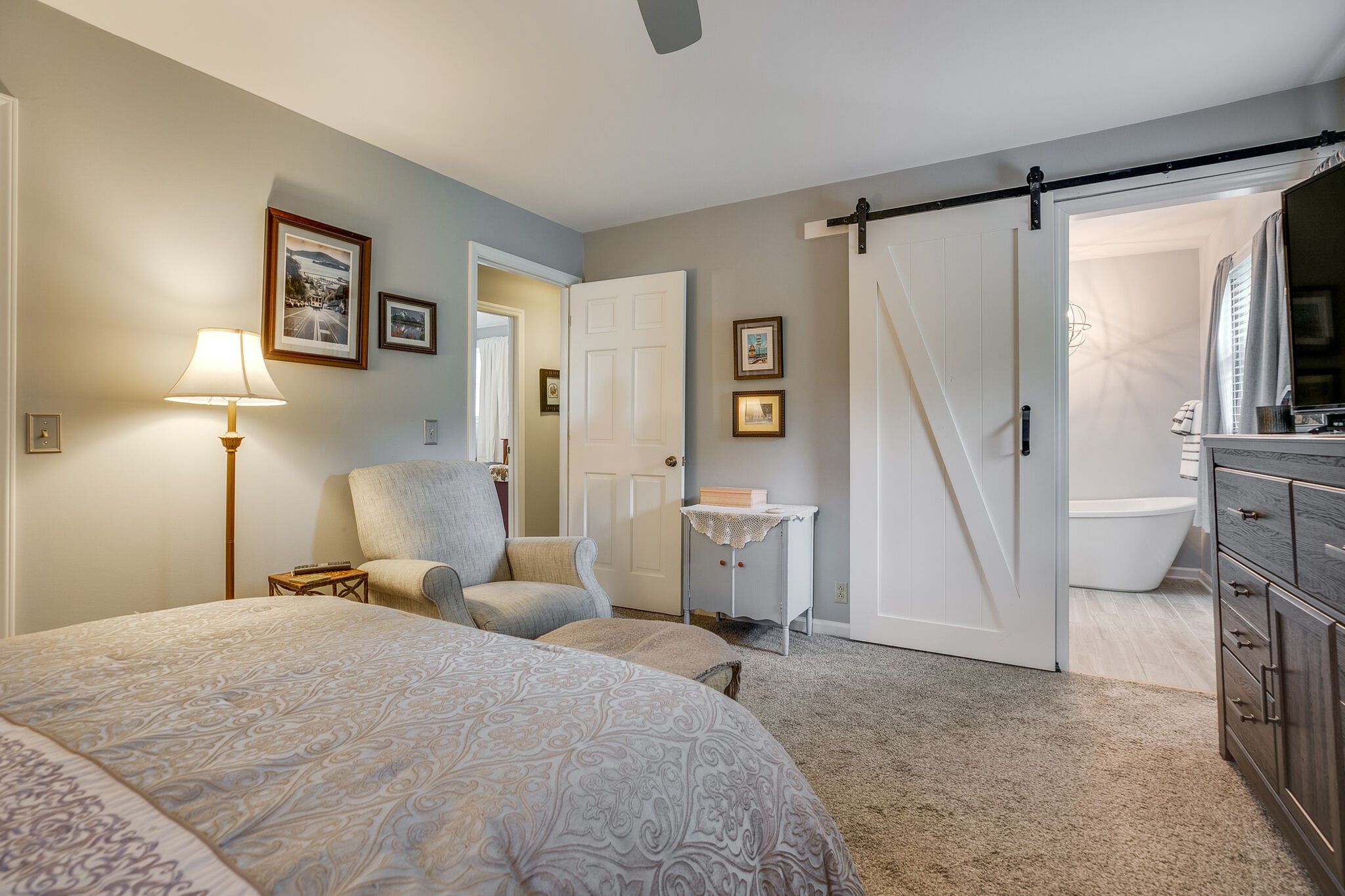 117 Paschal Drive Murfreesboro, TN 37128 - Photo 26 of 32 a bedroom with a bed a couch and a view of living room