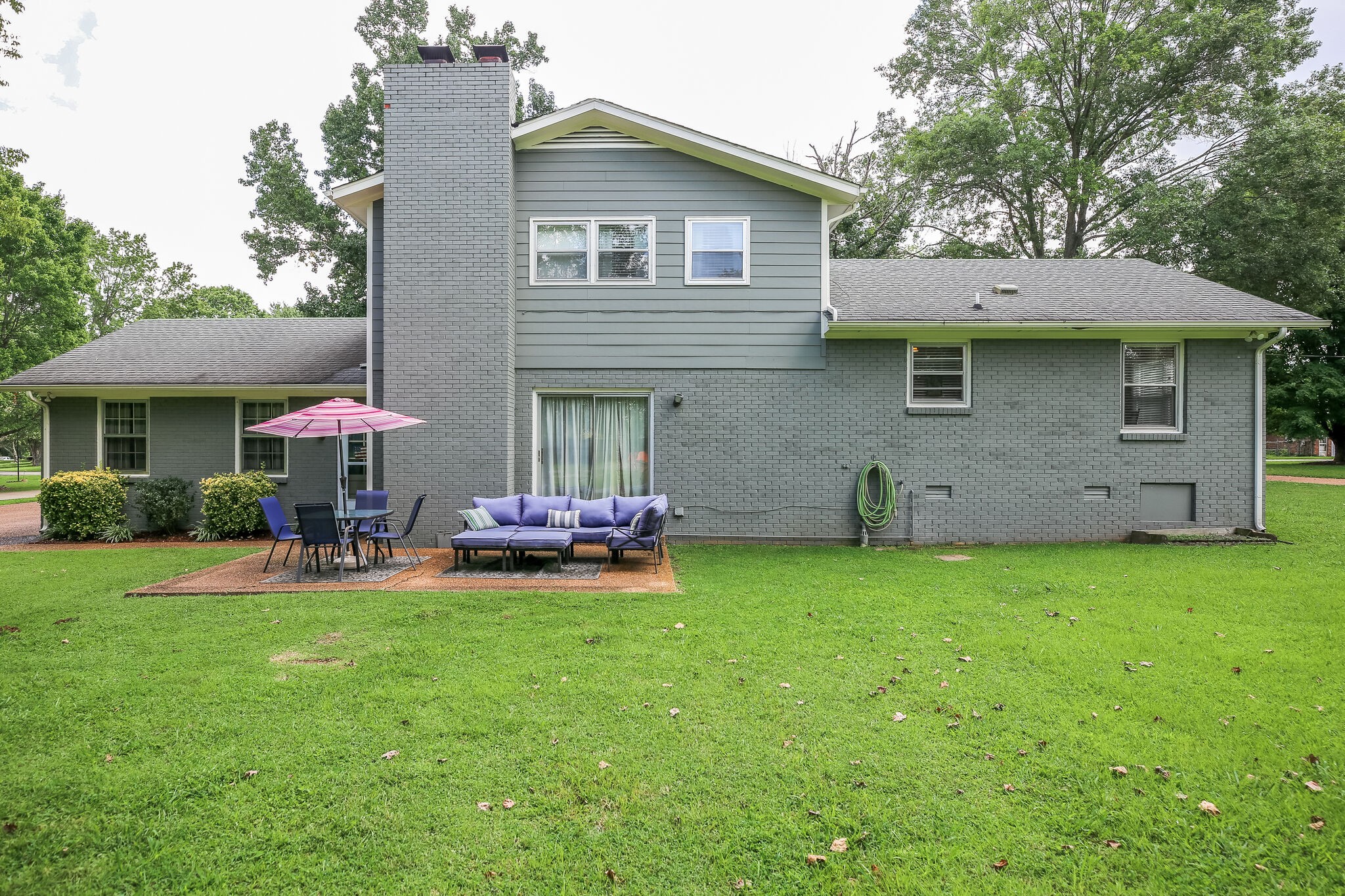 117 Paschal Drive Murfreesboro, TN 37128 - Photo 30 of 32 a view of a house with a yard and sitting area