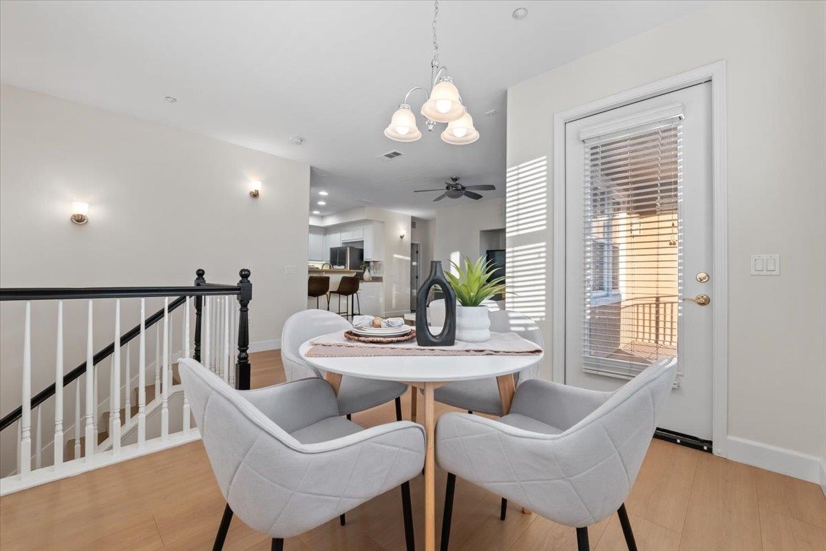 3251 Monaghan Street Dublin, CA 94568 - Photo 14 of 56 a view of a dining room with furniture window and wooden floor