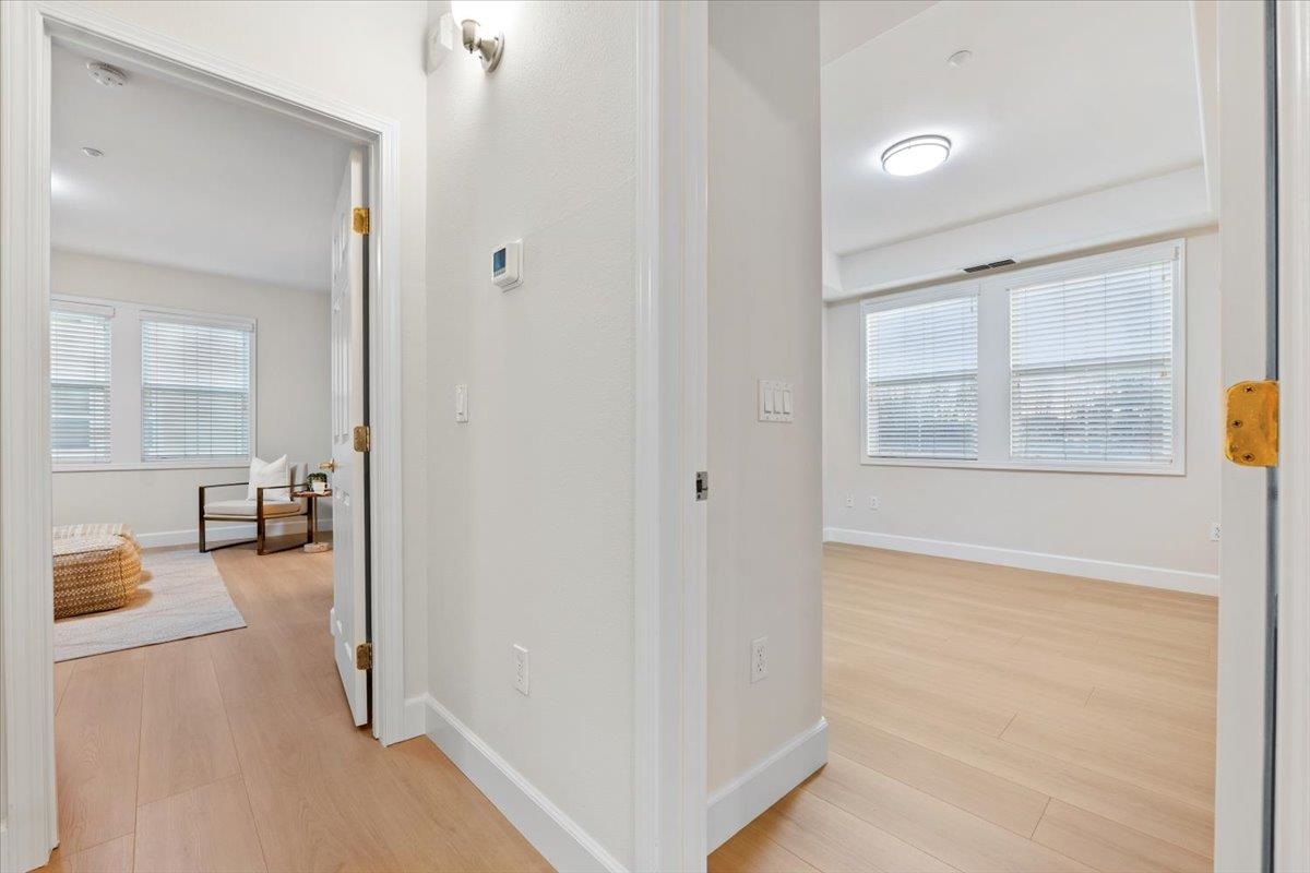 3251 Monaghan Street Dublin, CA 94568 - Photo 37 of 56 an entryway and a livingroom with wooden floor