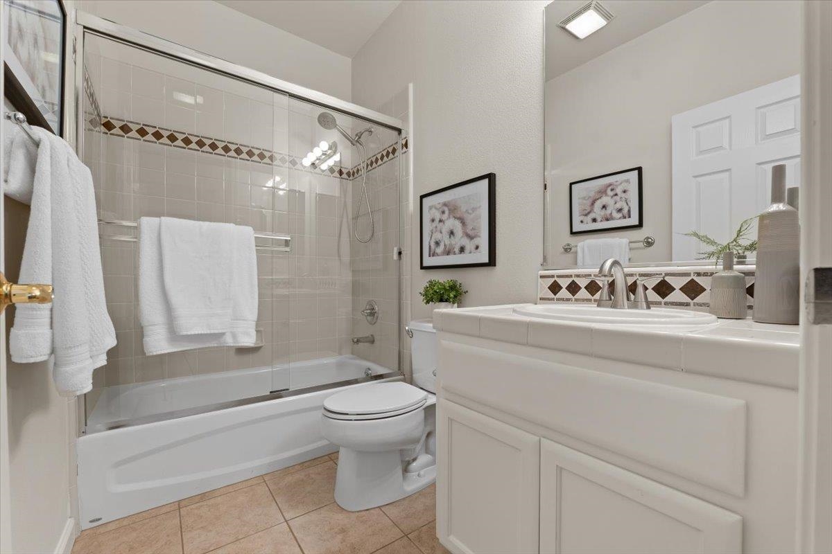 3251 Monaghan Street Dublin, CA 94568 - Photo 40 of 56 a spacious bathroom with a sink a toilet and a bathtub