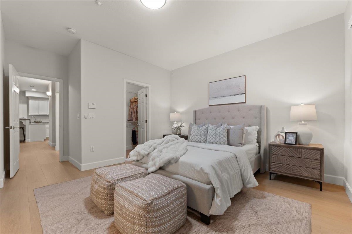 3251 Monaghan Street Dublin, CA 94568 - Photo 44 of 56 a bedroom with a bed and a lamp