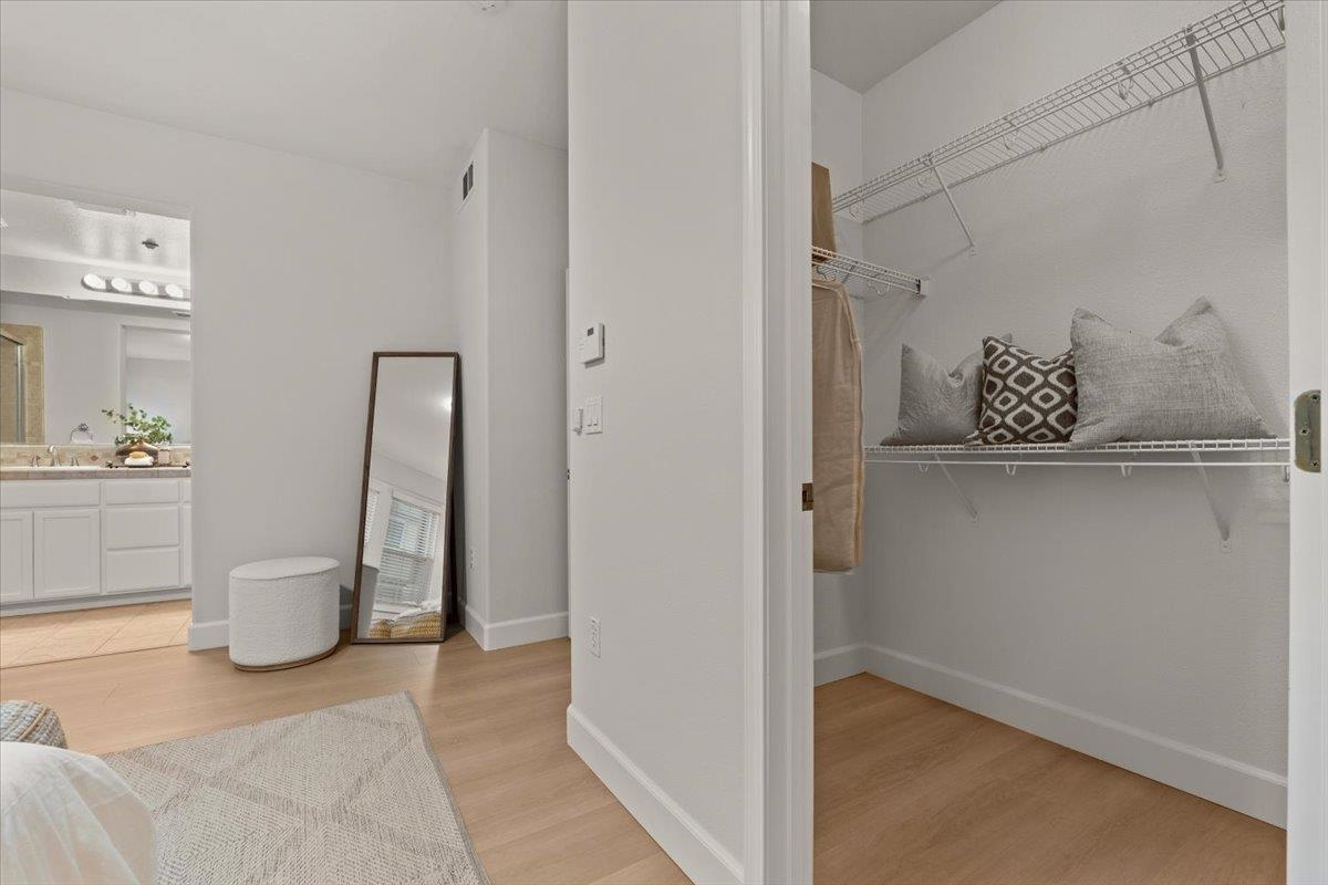 3251 Monaghan Street Dublin, CA 94568 - Photo 47 of 56 a view of a hallway with closet and cabinet