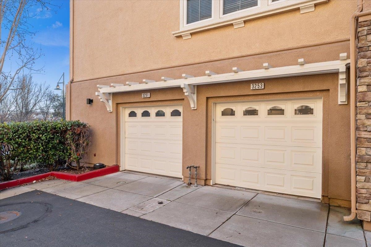 3251 Monaghan Street Dublin, CA 94568 - Photo 51 of 56 a front view of a house with garage