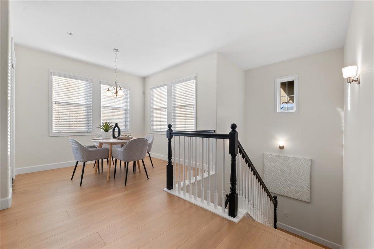 3251 Monaghan Street Dublin, CA 94568 - Photo 10 of 56 a view of a dining room with furniture window and wooden floor