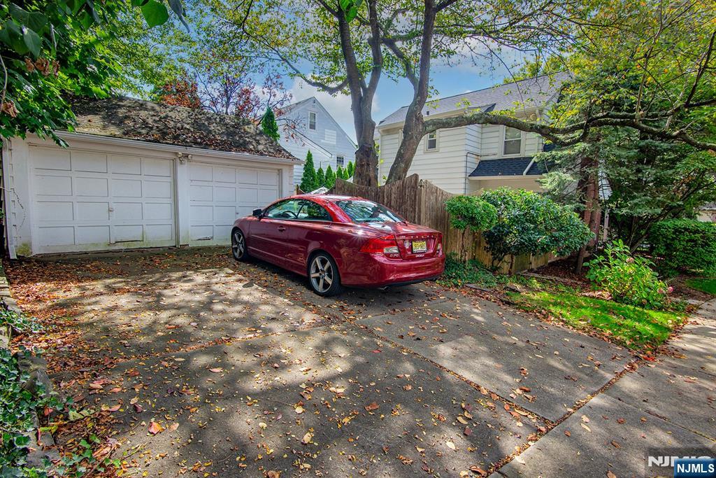 847 Red Road Teaneck, NJ 07666 - Photo 20 of 20 a front view of a house with a garden