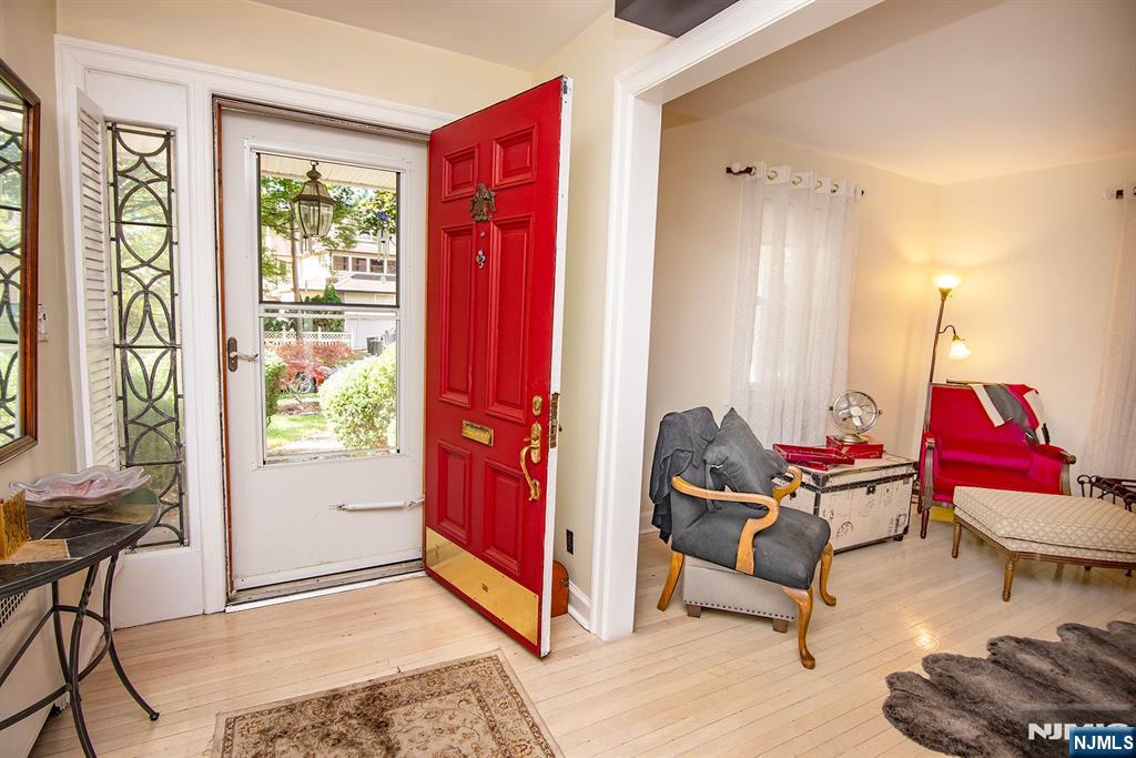 847 Red Road Teaneck, NJ 07666 - Photo 3 of 20 a living room with furniture and floor to ceiling windows