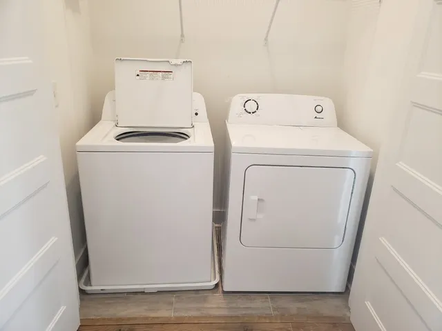 a utility room with dryer and washer