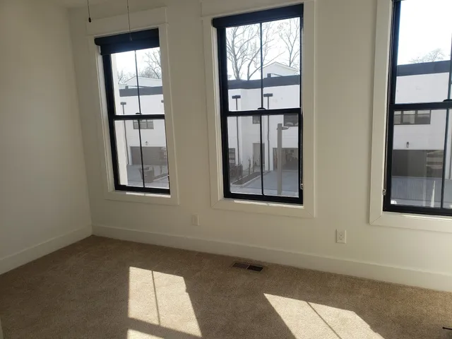 an empty room with windows