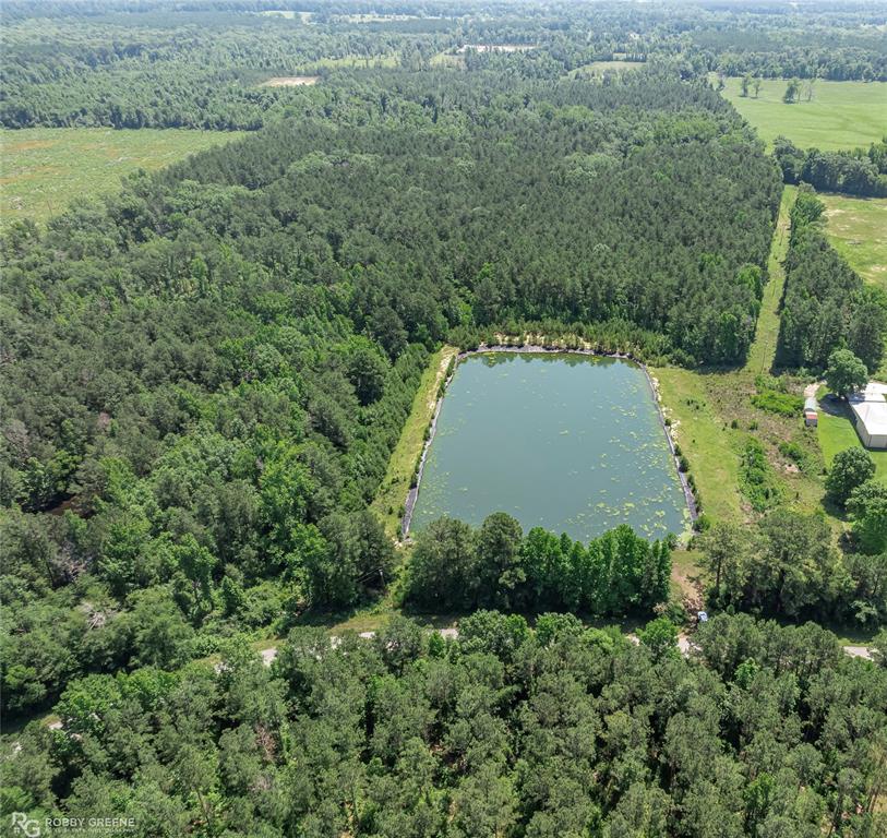 0 Springhill Church Road Ringgold, LA 71068 - Photo 3 of 5 an aerial view of a house with a yard and lake view