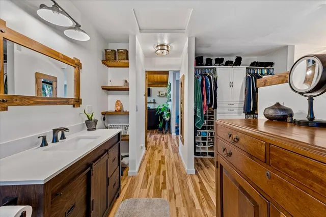 a view of a bathroom sink and a mirror