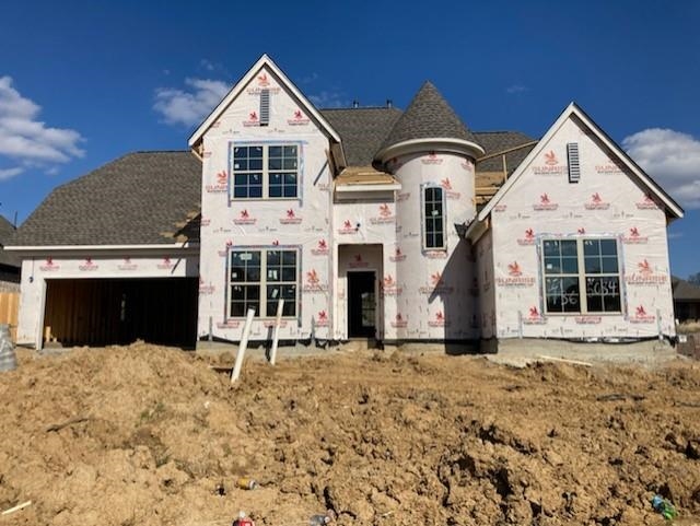 5084 Granite Creek Road Memphis, TN 38125 - Photo 2 of 2 a front view of a house with a yard