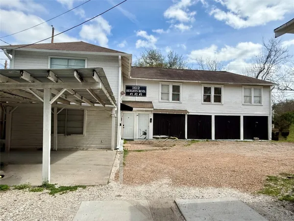 a view of a house with a garage