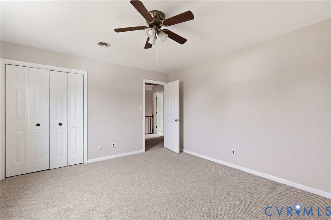 4548 Ridgecrest Lane Colonial Heights, VA 23834 - Photo 26 of 34 Carpeted bedroom with large closet