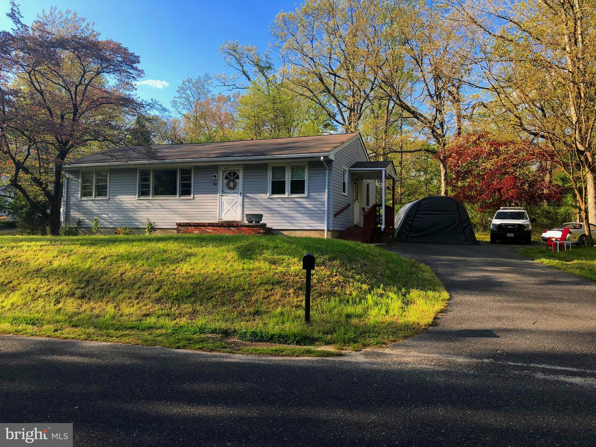607 North Broad Street Hainesport, NJ 08036 - Photo 1 of 24 a view of a house with swimming pool and porch