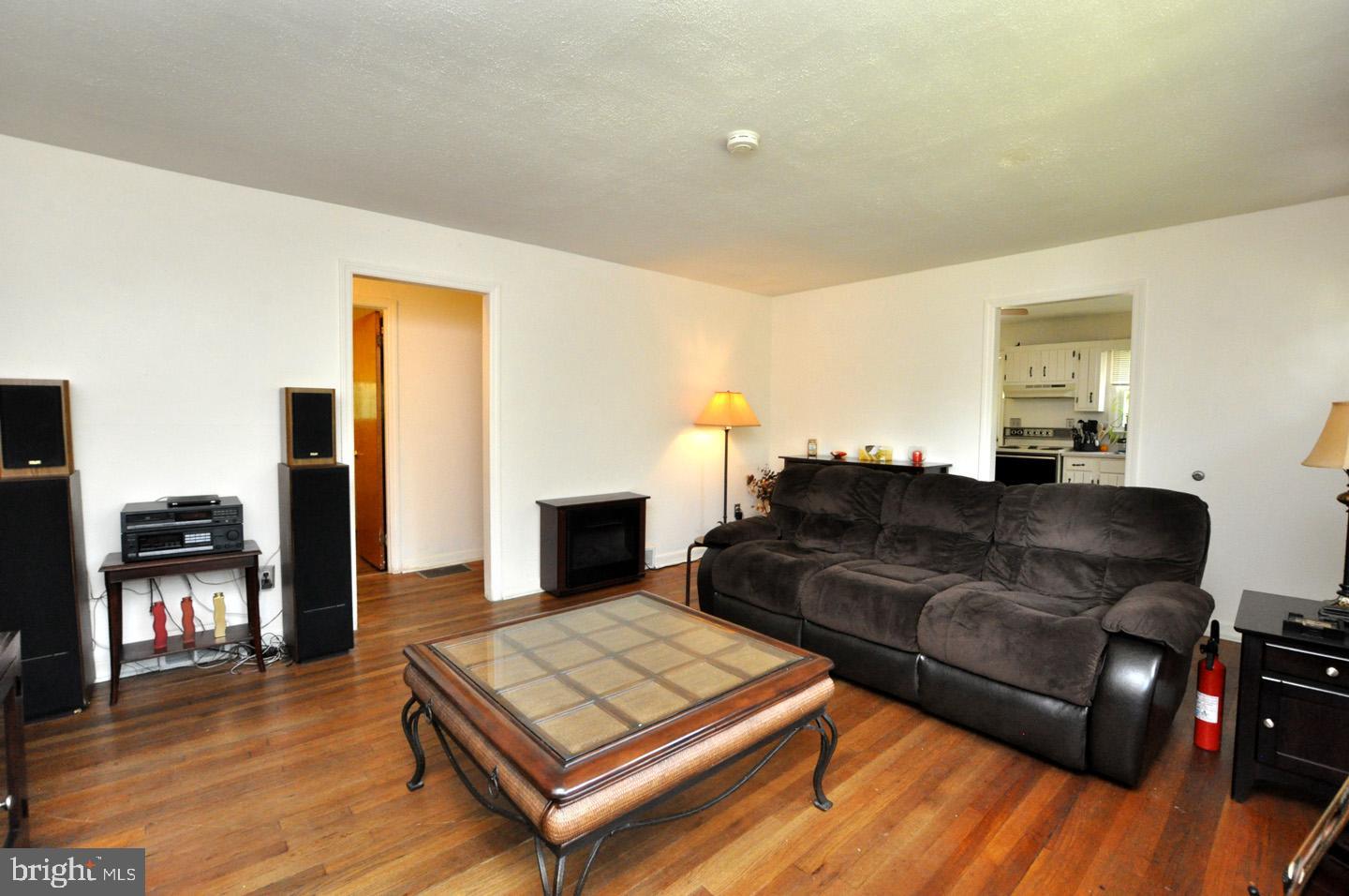 607 North Broad Street Hainesport, NJ 08036 - Photo 9 of 24 a living room with furniture and a wooden floor