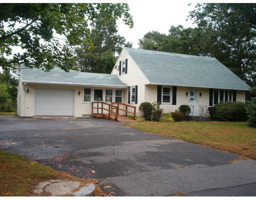 22 Ridgecrest Street Springfield, MA 01118 - Photo 1 of 1 a front view of a house with a garden