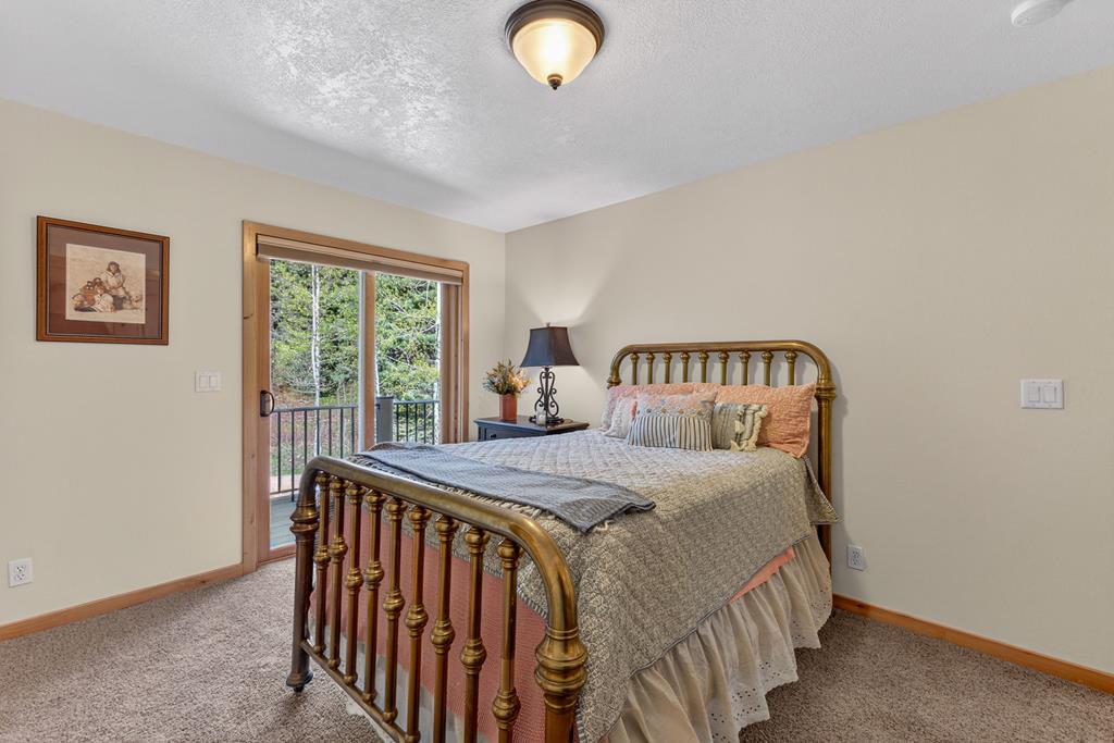 31 Eagle Trail Cascade, ID 83611 - Photo 32 of 50 The second guest room with access to the balcony.