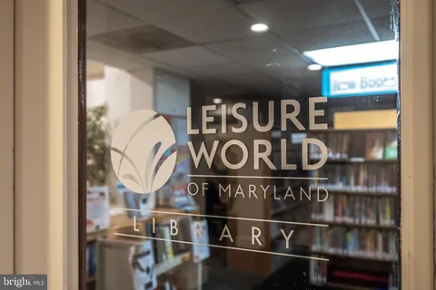 a view of a dining area with furniture and wooden floor
