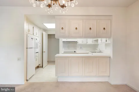 a bathroom with a sink a vanity and a mirror