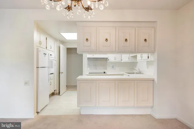 a bathroom with a sink a vanity and a mirror