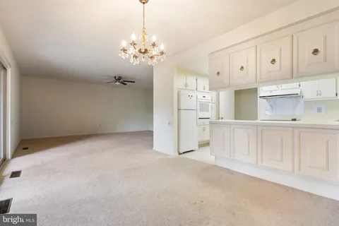 a view of a kitchen with cabinet and cabinets