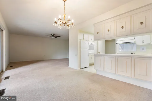 a view of a kitchen with cabinet and cabinets