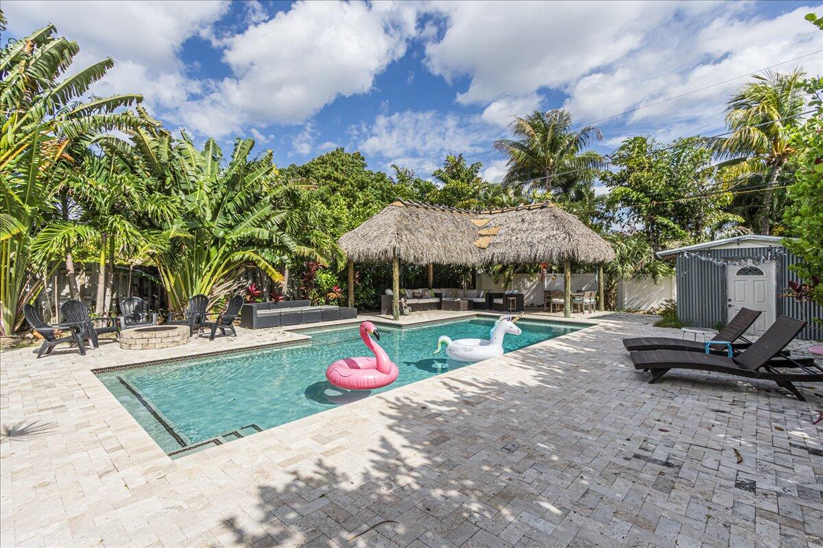 411 Southwest 1st Street Boca Raton, FL 33432 - Photo 1 of 47 Backyard with Floats